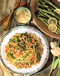 Fresh asparagus recipes can be simple, like steamed asparagus with lemon (upper right) or more ambitious, like smoked salmon and asparagus with linguine (main plate).